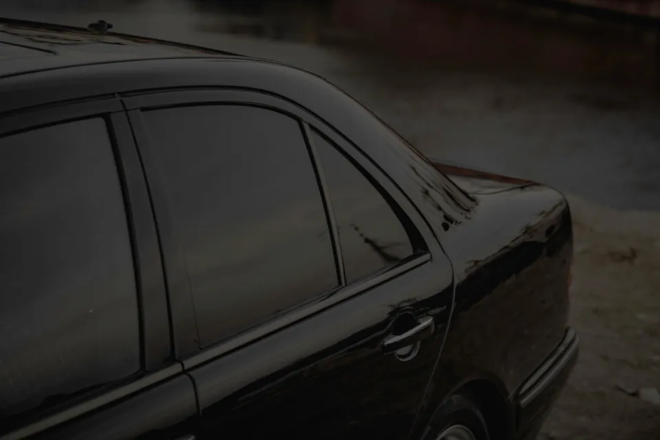Black sedan with tinted windows